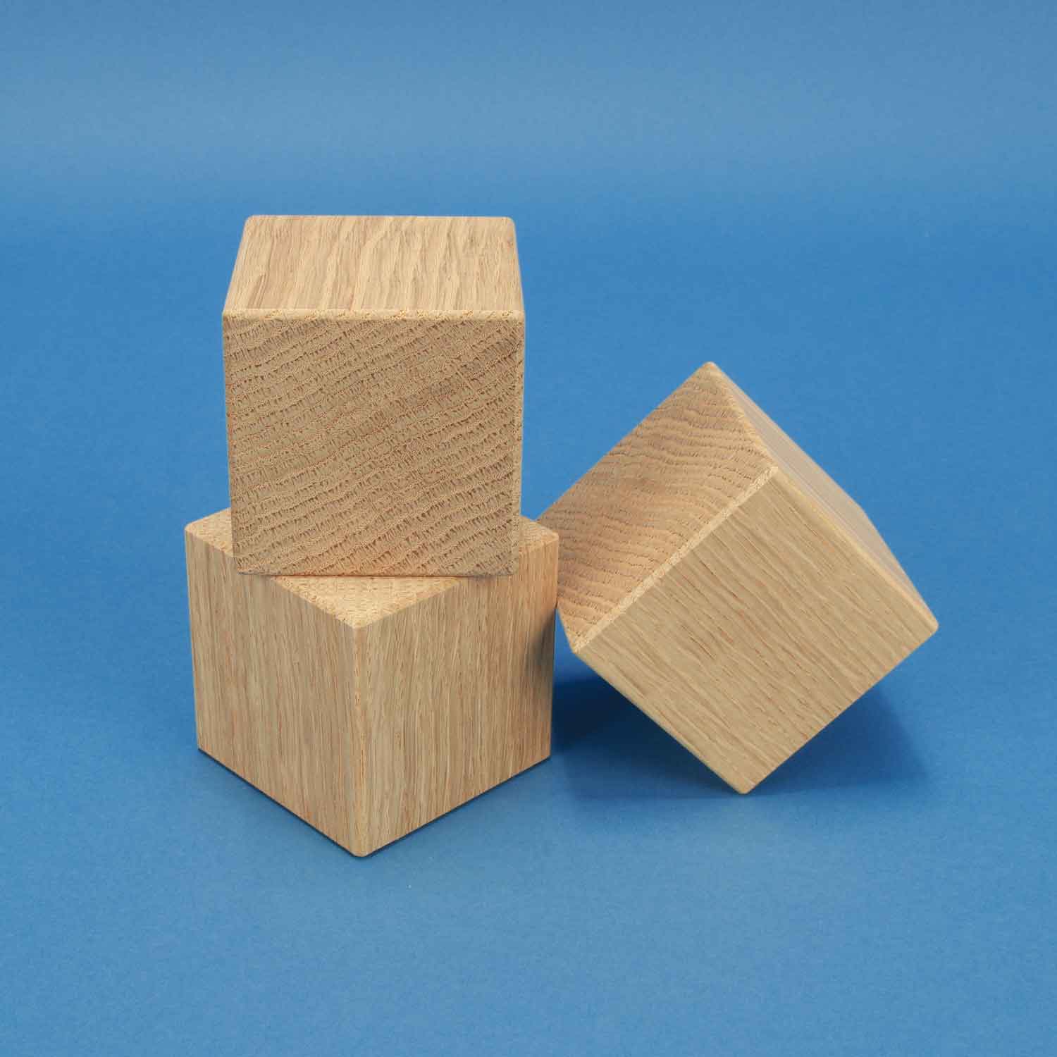 Wooden cubes and dices made of beech, maple, oak and walnut
