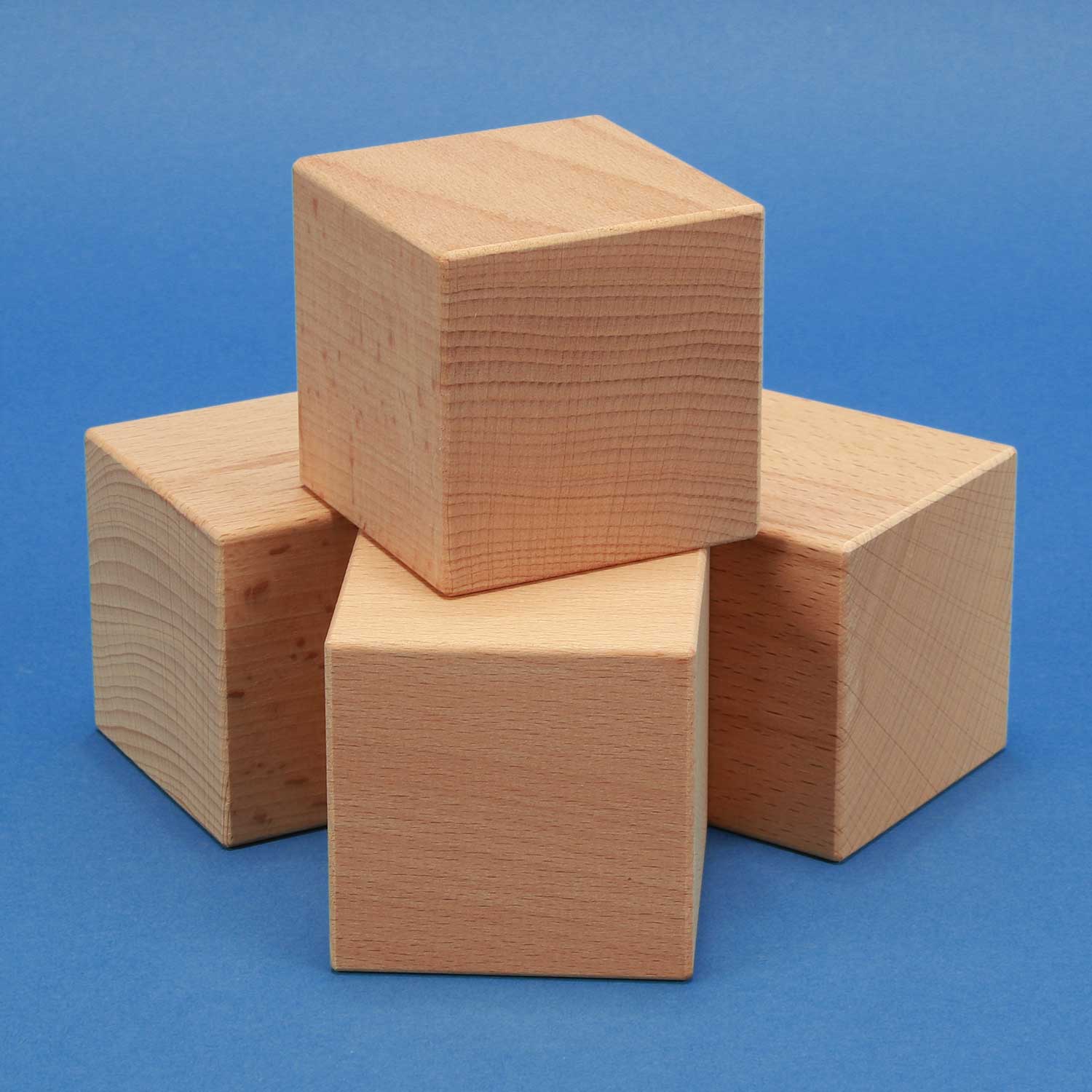 Wooden cubes and dices made of beech, maple, oak and walnut